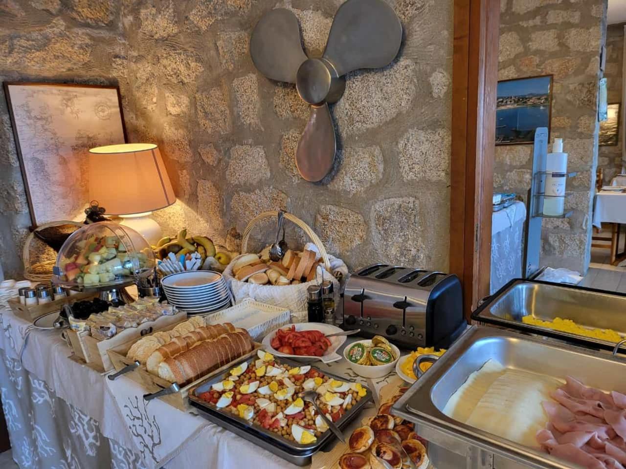Hotel Olimpia Baja Sardinia Exteriör bild